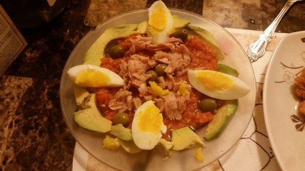 Carrot salad special: boiled carrot with spicy flavor , hard boiled egg , tuna , capers, olives, avocato