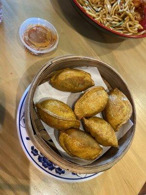 Crispy chicken basil dumplings with dragon sauce