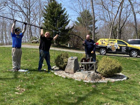 The team from Busy Bee replacing our dead water well pump!