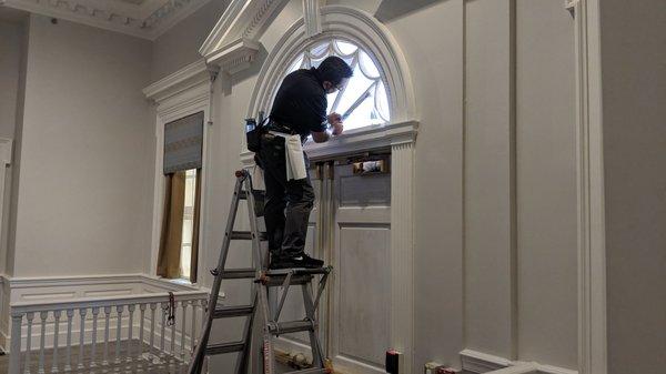 Installing film at the Delaware Archives Building.