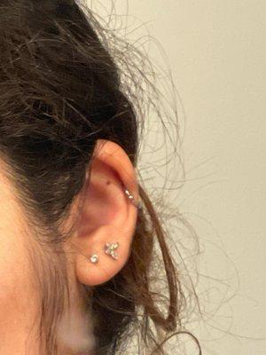 helix piercing done about 5 years ago and my second lobe (the diamond butterfly)