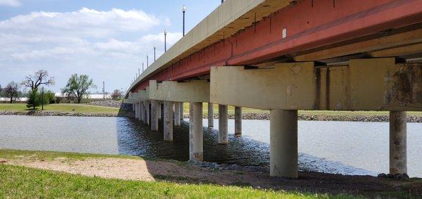 Overpass with bird nests under the overhang