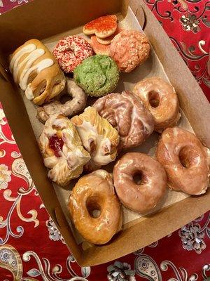 Glazed Donuts, Pistachio Muffin, Strawberry Muffin, Raspberry Danish, Blueberry Donut.