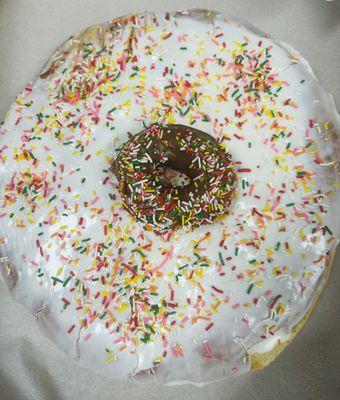 Large donut with vanilla sprinkle