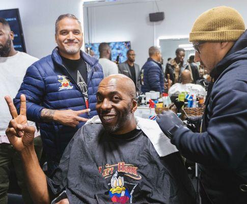 Former NBA start John.Sally happy getting a beard trim at Left Hook Barbershop