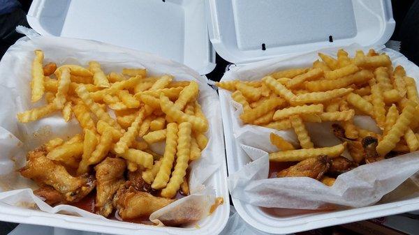 Sweet and spicy wings with french fries and drinks