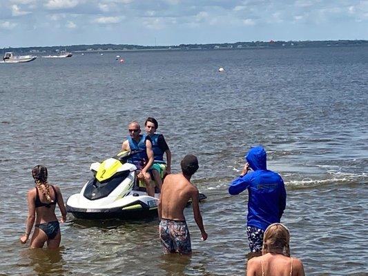 Some of our party being guided back in after their time on the water