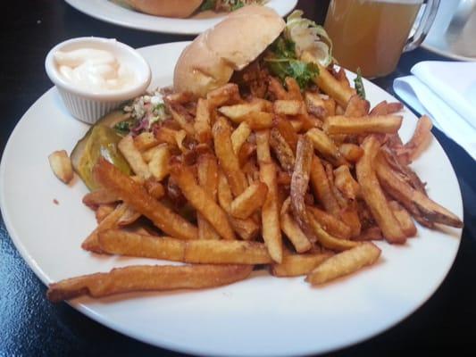 Pulled pork with fries, malt slaw, sweet hot pickles and a side of mayo. to dip my fries in.  Delicious!