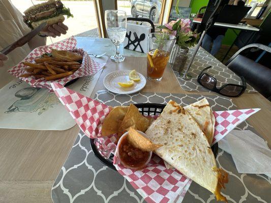 Chicken quesadillas and burger.