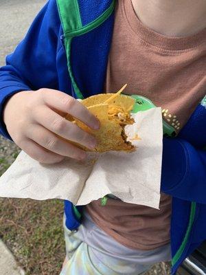 $2 tacos, they come loaded with lettuce, tomato, cheese and sour cream, but my son only likes cheese.