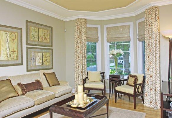 Modern living room, with Roman shades and drapery panels. Elmhurst, IL