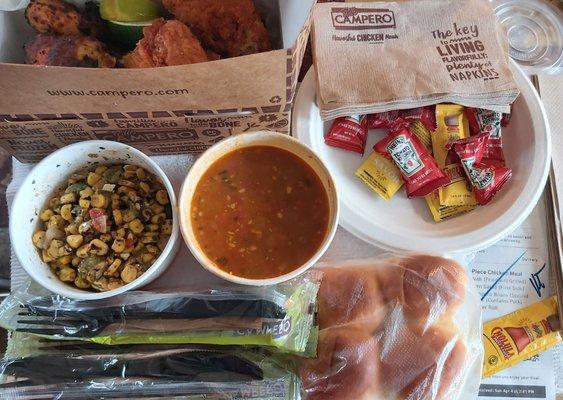 8-Piece meal: 2 sides, rolls, plates,utensils, napkins and ketchup/hot sauce/lime wedges.