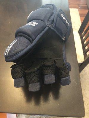 Repaired glove with new palm and gusset