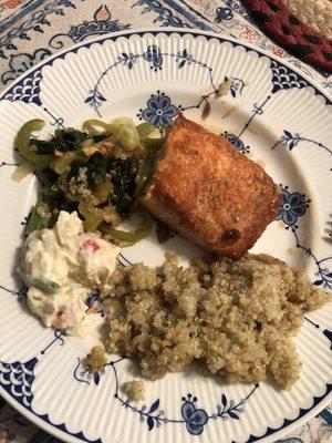 Salmon, quinoa, greens and potato salad.