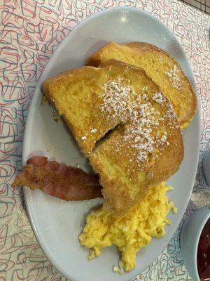 French toast, eggs, and bacon