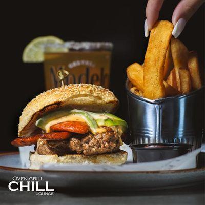 Bite into Bliss! Get your hands on our legendary burger and its crispy fries.