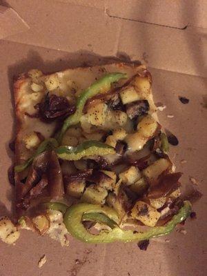 The mushroom pizza I ordered with added onions and peppers and potatoes was delivered with next to no mushrooms at all