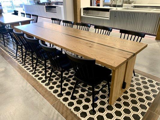 solid white oak dining table with metal detail