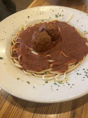 Spaghetti and meatballs with an extra meatball.