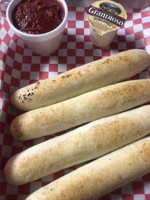 Breadsticks, pan sauce, garlic sauce