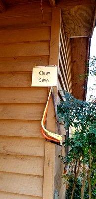 Clean saws and twine are free. They also blow the bugs off of the trees for you.