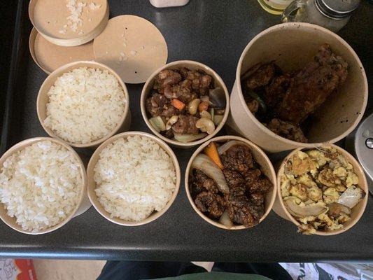 Rice, cashew chicken, orange beef, salt and pepper pork, egg omelet and radish