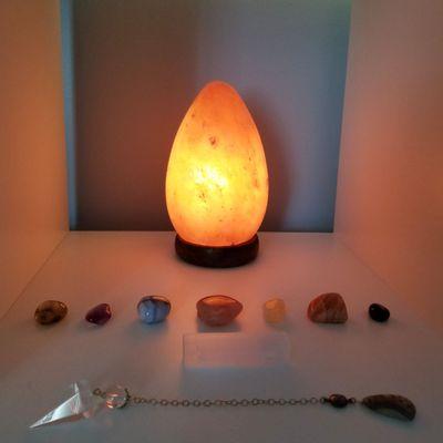 Chakra stones used in reiki sessions.