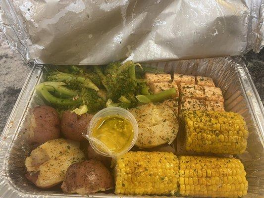 Broccoli, salmon, corn , and potato