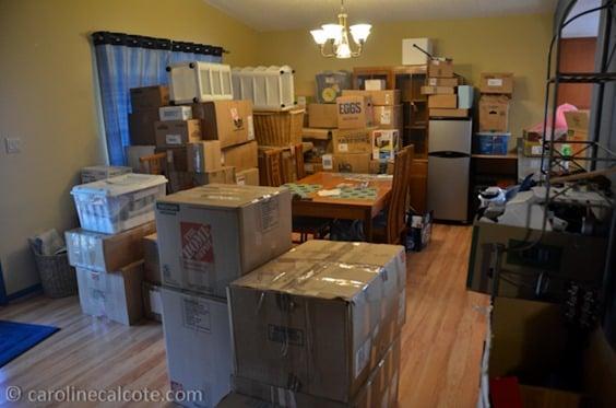 Boxes stacked in the living room, neatly, for easy access