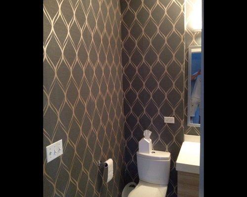 Bathroom wallpaper installation.