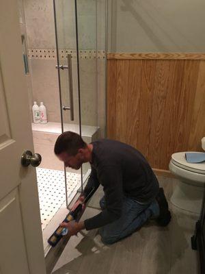 Installing heavy glass shower door