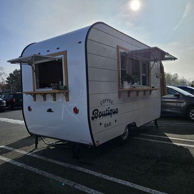 The coffee cart/truck.  Super cute with two pink tables with two chairs out front.