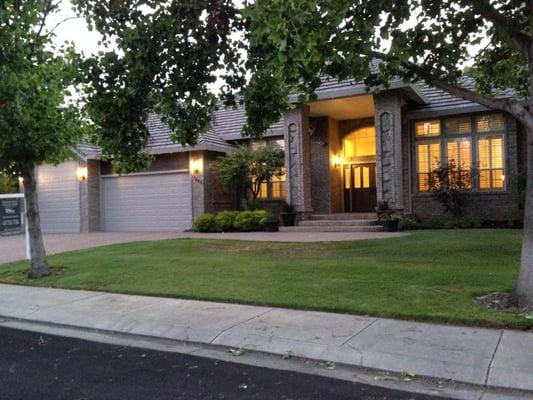 This home needed some pizazz at the curb - a painter / artist created an extruded paint effect above the garage doors, and pa...