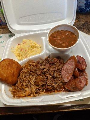 3 meat plate; chopped pork, chopped beef, sausage, beans and potatoes salad.  Yum!