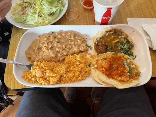 Re-fried beans and rice. Shredded chicken taco; carnitas taco.