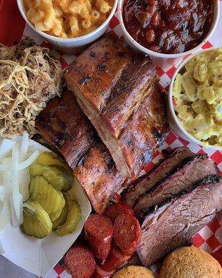 Pulled pork, baby back ribs, tri-top and hot links