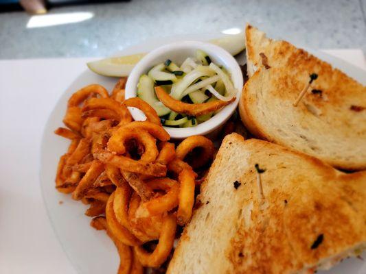 Cucumber salad  and curly fries