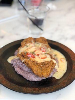 Fish and  Geechie Boy Grits with heirloom tomatoes & pepper gravy