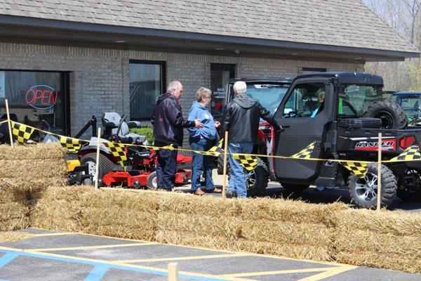 Customers Browsing Inventory, specifically a Polaris Ranger.