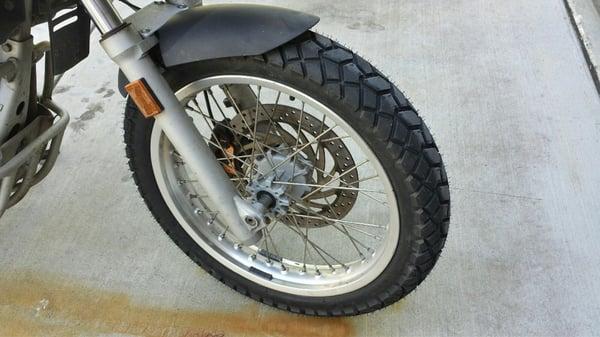 New front tire professionally installed by Lou.