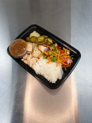 Spicy chicken meal: Orange pepper chicken jasmine rice mix veggies jalapenos red salsa