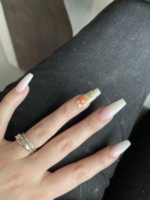 White and pink ombré nails with flower.