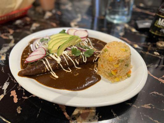 Pretty fantastic meal. This is the Enmolades (+sour cream +avocado). The sauce is rich and thick and really works well with everything!