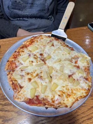 Wife's pineapple and ham pizza.  Never would have thought I'd marry someone who liked pineapples on pizza.