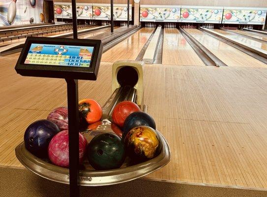 Bowling lanes with live scoring.