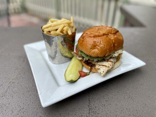 "Chicken Santorini Burger" (grilled rosemary chicken breasts, dilled tzatziki sauce, Roma tomato, tomato olive salsa with crispy romaine)