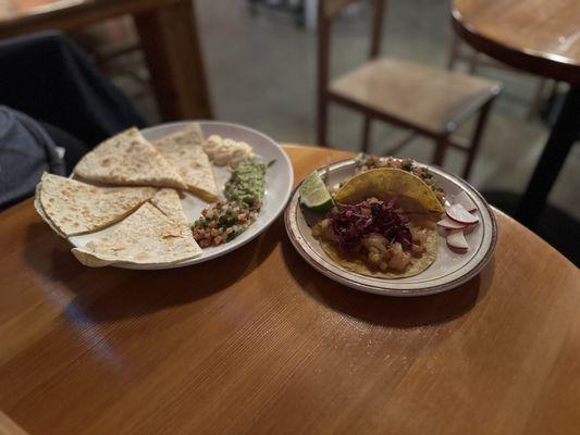 Delicious meal of fish and chicken tacos with a cheese quesadilla!