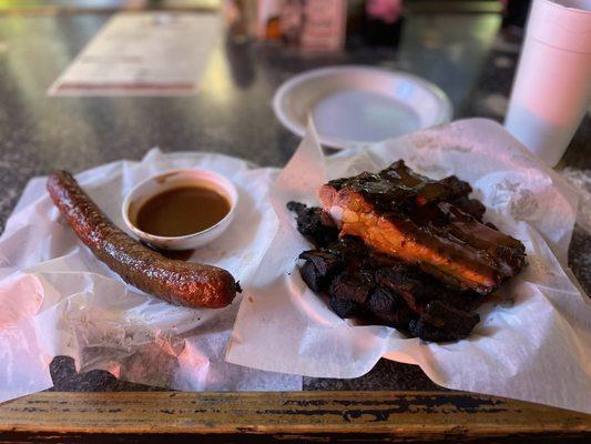 Sausage link and half slab of ribs