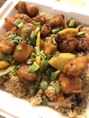 Orange Sriracha chicken, fried rice, veggies.