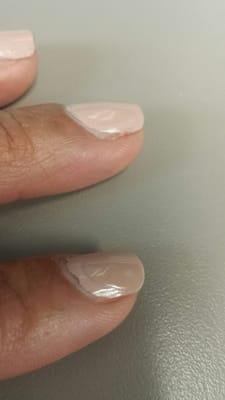 Top coat is only on half the nail.